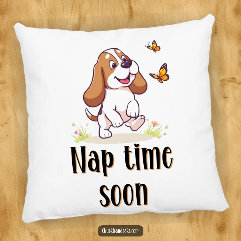 Funny Basset Hound with droopy ears chasing a butterfly, humorous dog pillow, droopy ears accent, soft and funny gift.