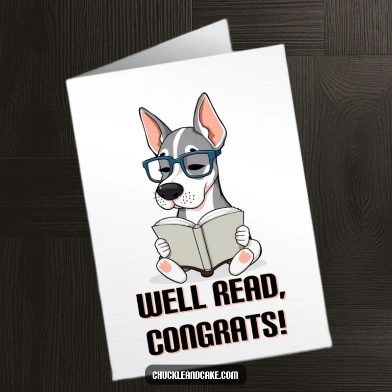 Funny Free Printable Congratulations Card: A Grand Dane wearing tiny glasses studies a book intently, celebrating wisdom.