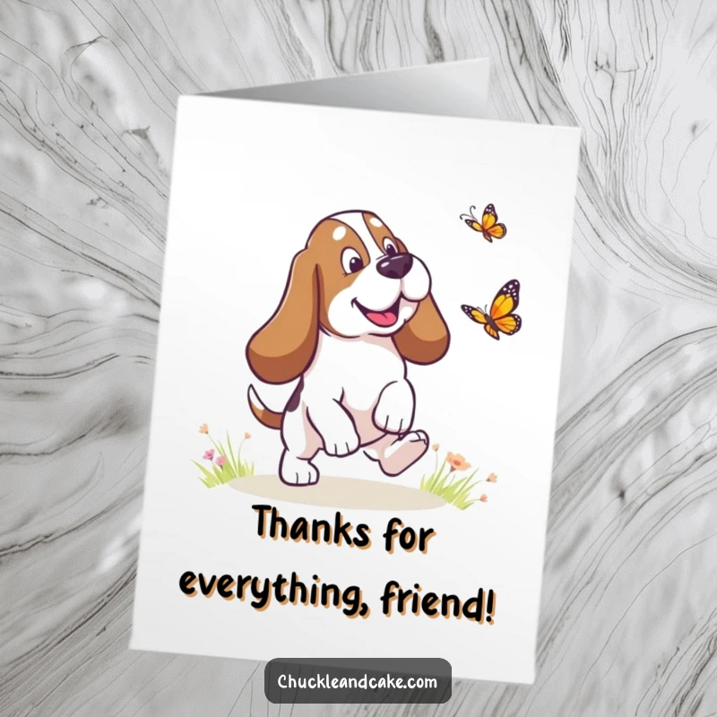 Funny Free Printable Thank You Card: A Basset Hound with notable droopy ears playfully chases a butterfly, sending thanks with glee.