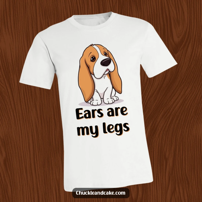 Funny Basset Hound with droopy ears tripping over its own long ears, clumsy dog t-shirt, humorous pet design, great funny gift for dog lovers.