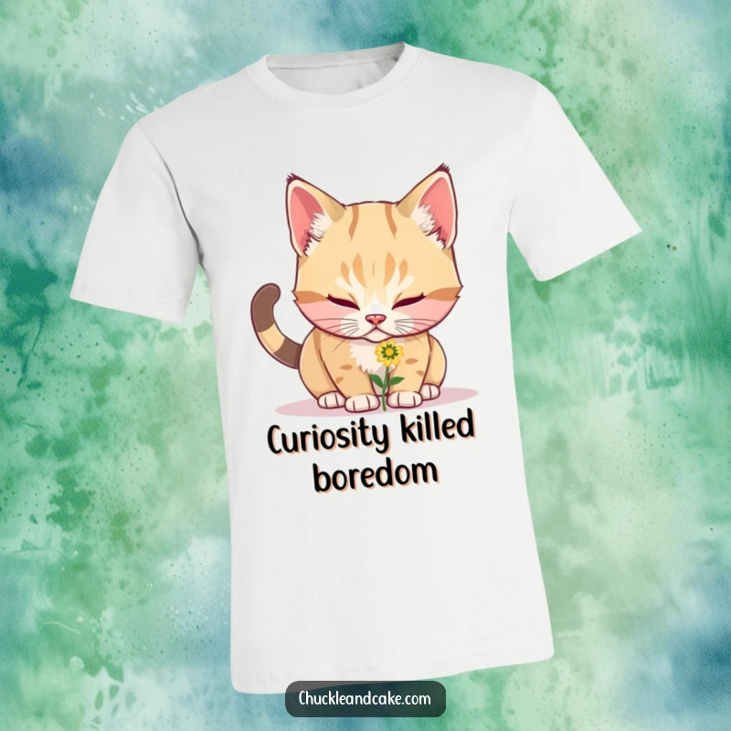 Funny Bobtail cat with its nose close to a small flower, captured in a moment of innocent, humorous exploration on a t-shirt.