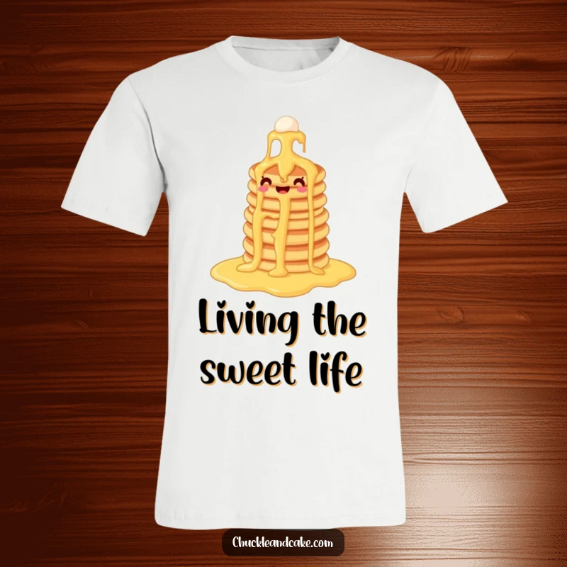 Funny pancake t-shirt featuring a stack of pancakes gleefully descending a sweet syrup waterfall, embodying breakfast bliss.