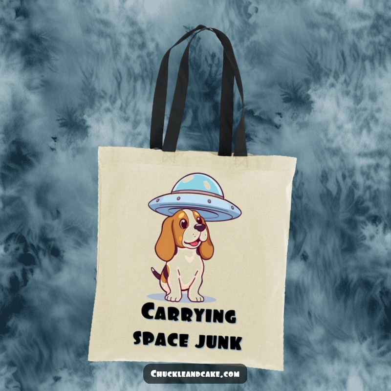 Funny Basset Hound Tote Bag depicting a dog curiously watching a UFO, ideal for everyday use and alien enthusiasts.